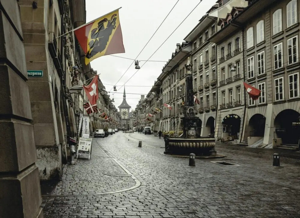 Discover the picturesque cobblestone streets of Bern, Switzerland, capturing the city's historic charm.